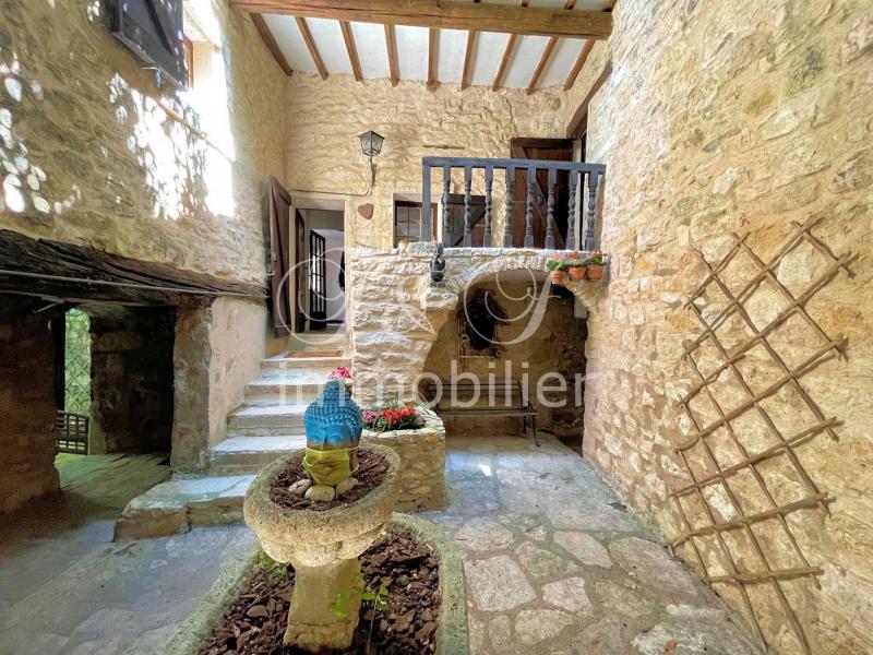 Village house with courtyards and terraces