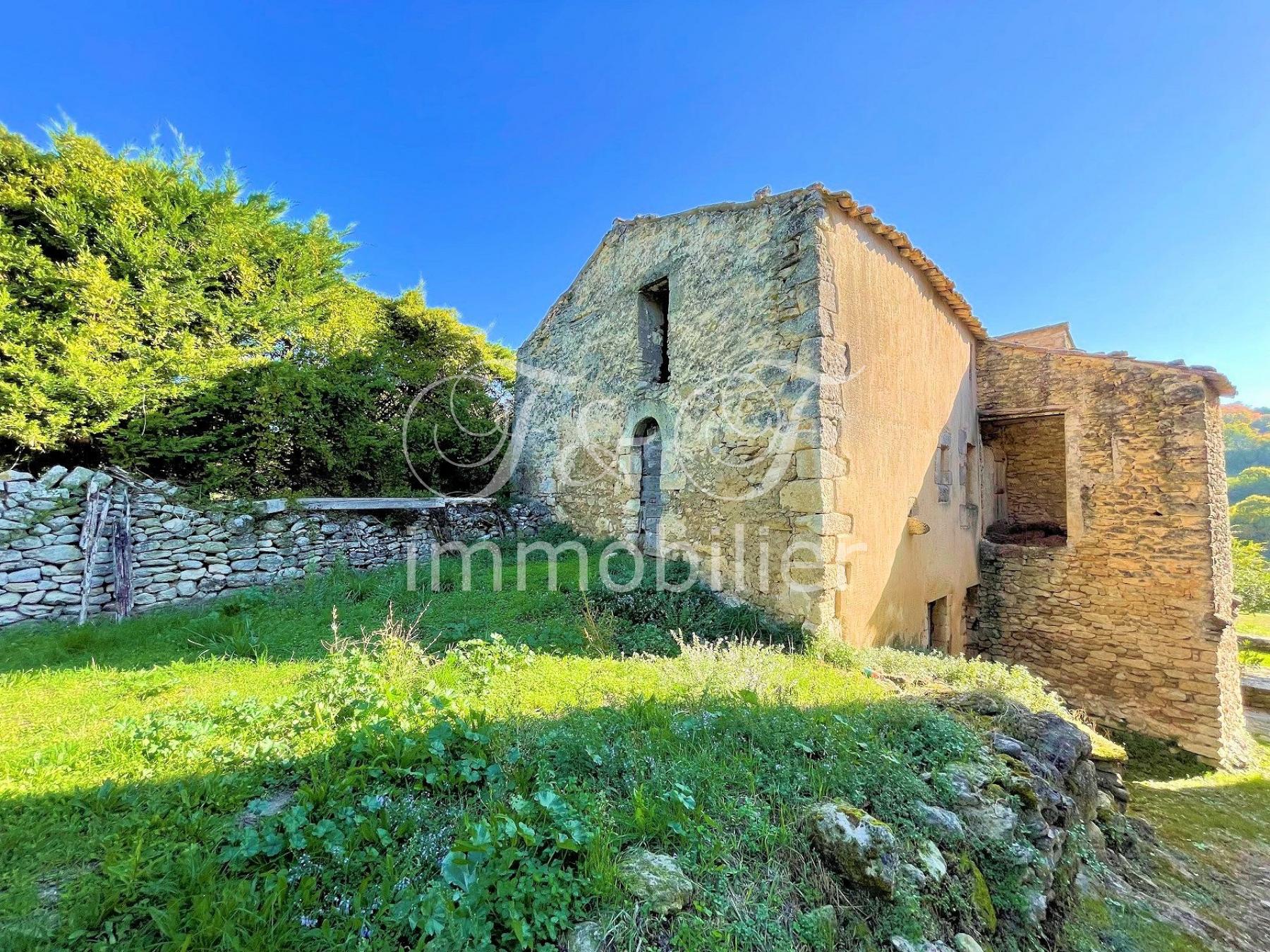 Village house to restore with land