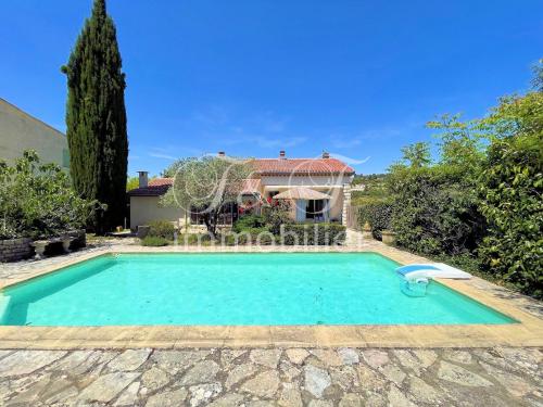 Maison avec jardin, piscine et garage