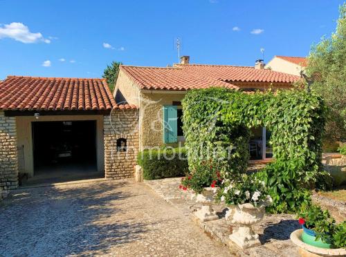 Petite maison avec jardin à Saignon